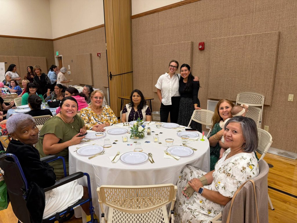 Relief Society sisters around a dinner table