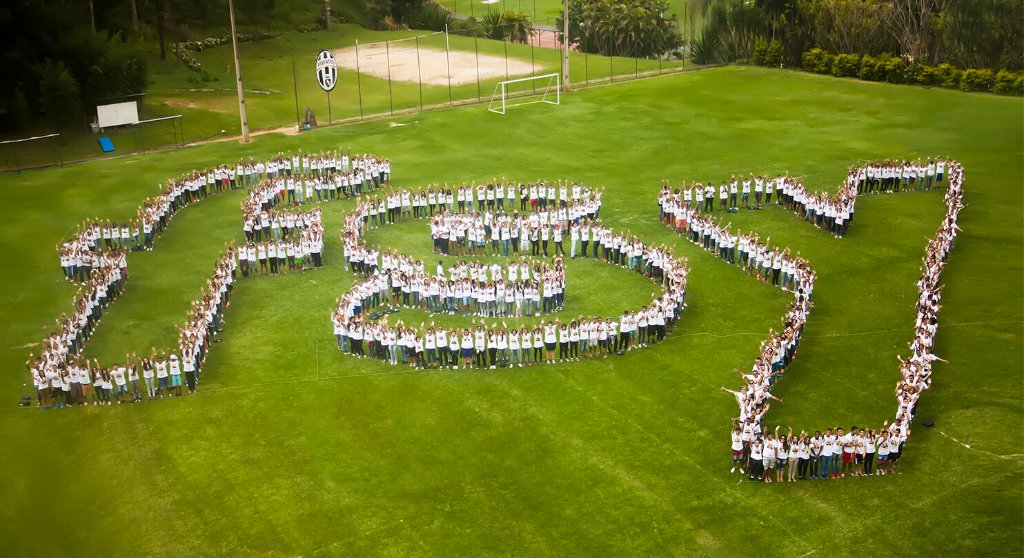 Youth forming FSY on a field