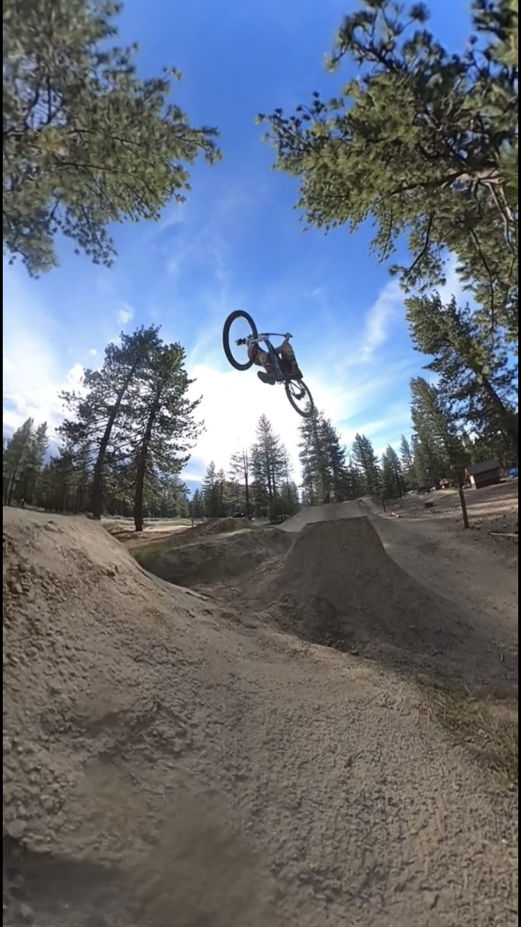Backflip over the dirt jumps