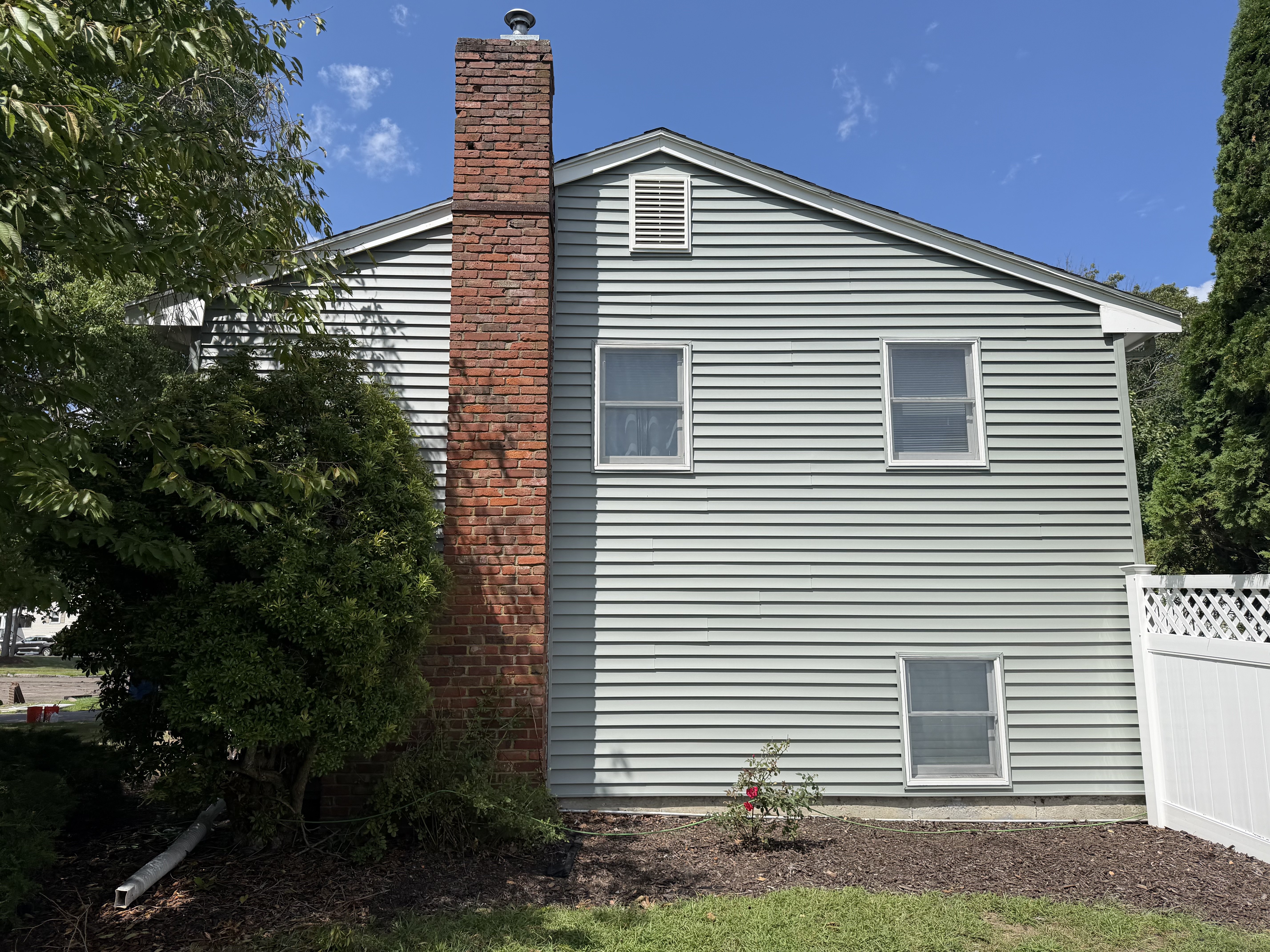 Siding & Brick Chimney