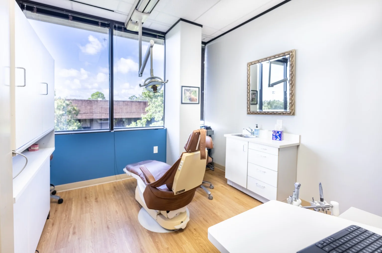 Clean, modern dental operatory with digital equipment at Echo Lane Dental