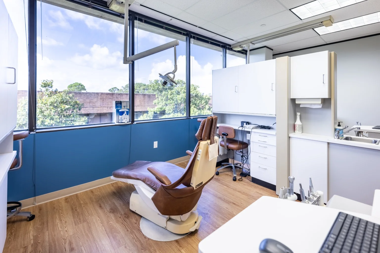 Modern dental operatory with natural light at Echo Lane Dental