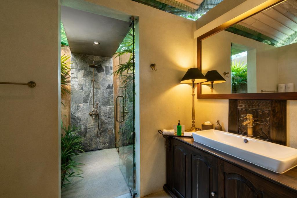Bathroom Suite — Walk-In Stone Shower with Greenery
