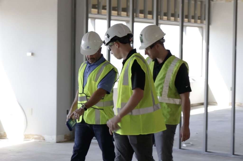 Contractors reviewing conditions