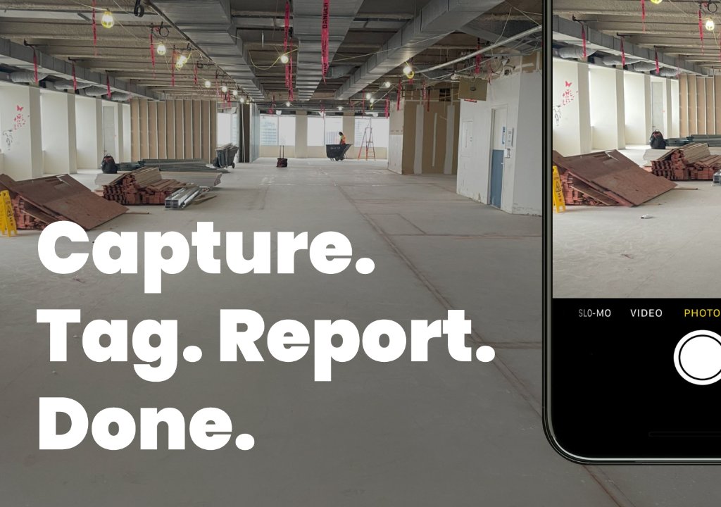 Contractor taking photos with phone inside commercial jobsite