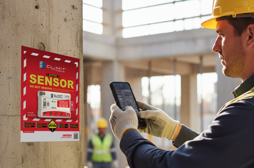Jobsite worker scanning the QR code on an active CLīMIT sensor mounted to a concrete pillar