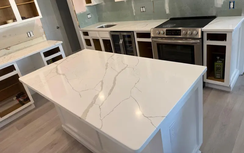 White quartz kitchen island and countertops with grey veining, Schenectady