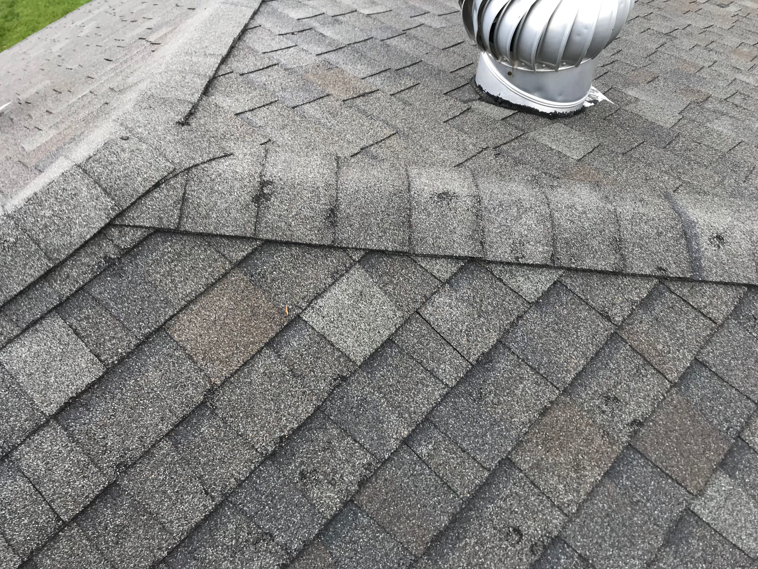 Hail damage on an asphalt shingle roof