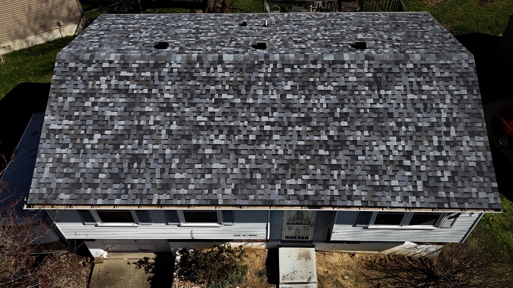 New standing-seam metal roof installed with precision on a Southern home