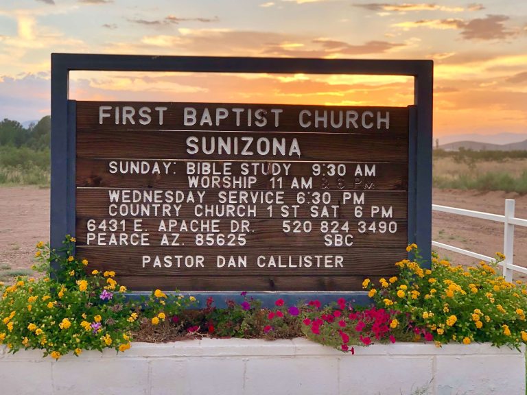 First Baptist Church Sunizona sign at sunset