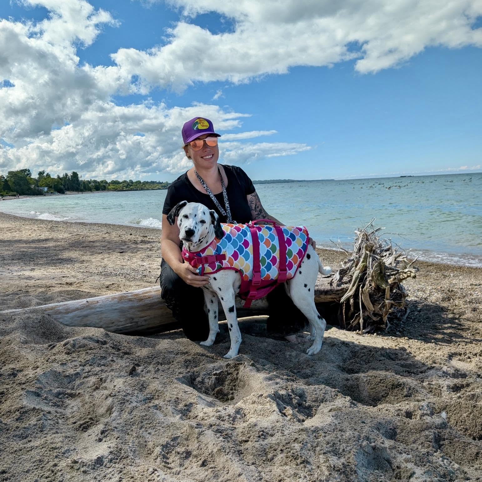 Christine out on a trail with dogs