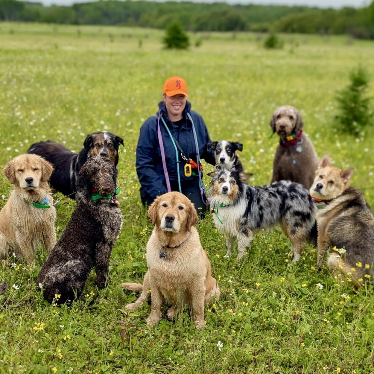 Christine outdoors with dogs on a Northern Ontario trail