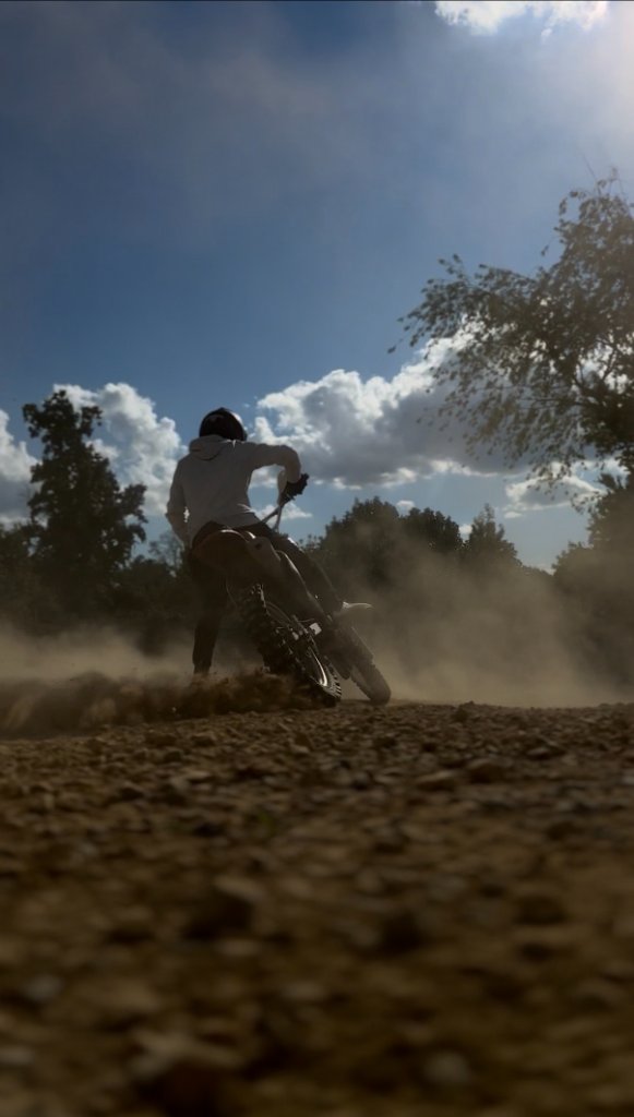 Rider roosting dirt