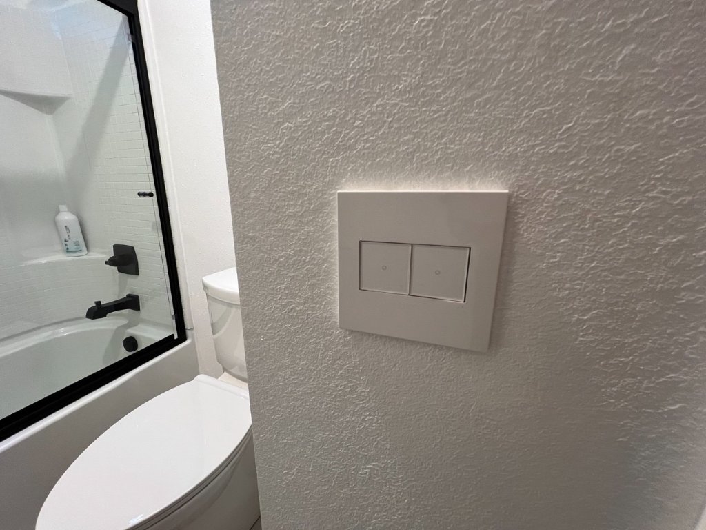 LeGrand Wave switch — white — girls bathroom