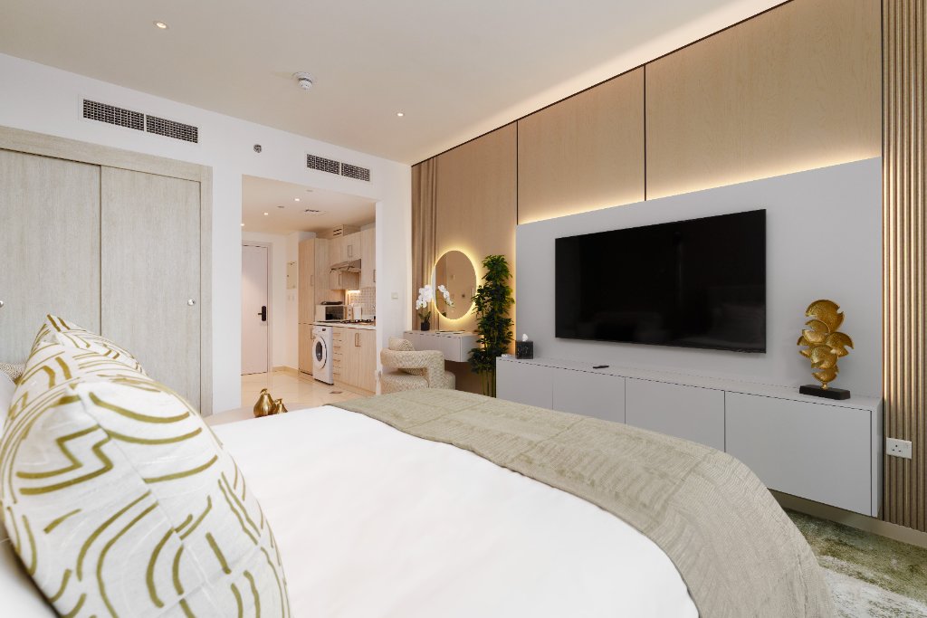 Bed with kitchenette view