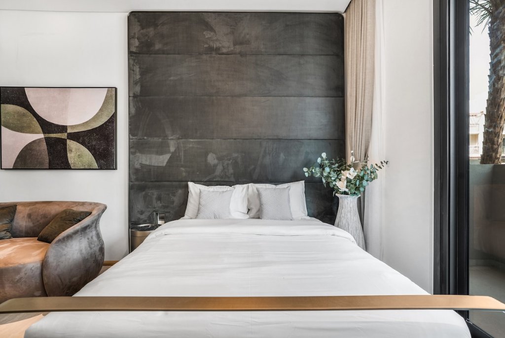 Bedroom with designer headboard