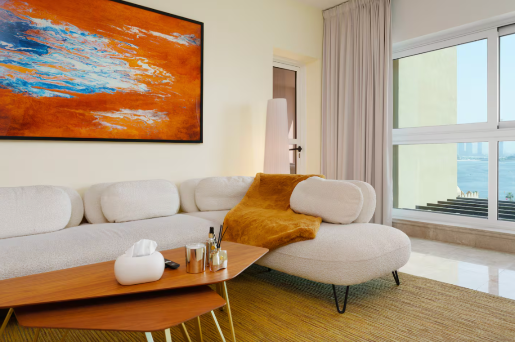 Living room with orange artwork