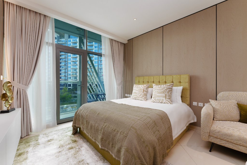 Bedroom with balcony view