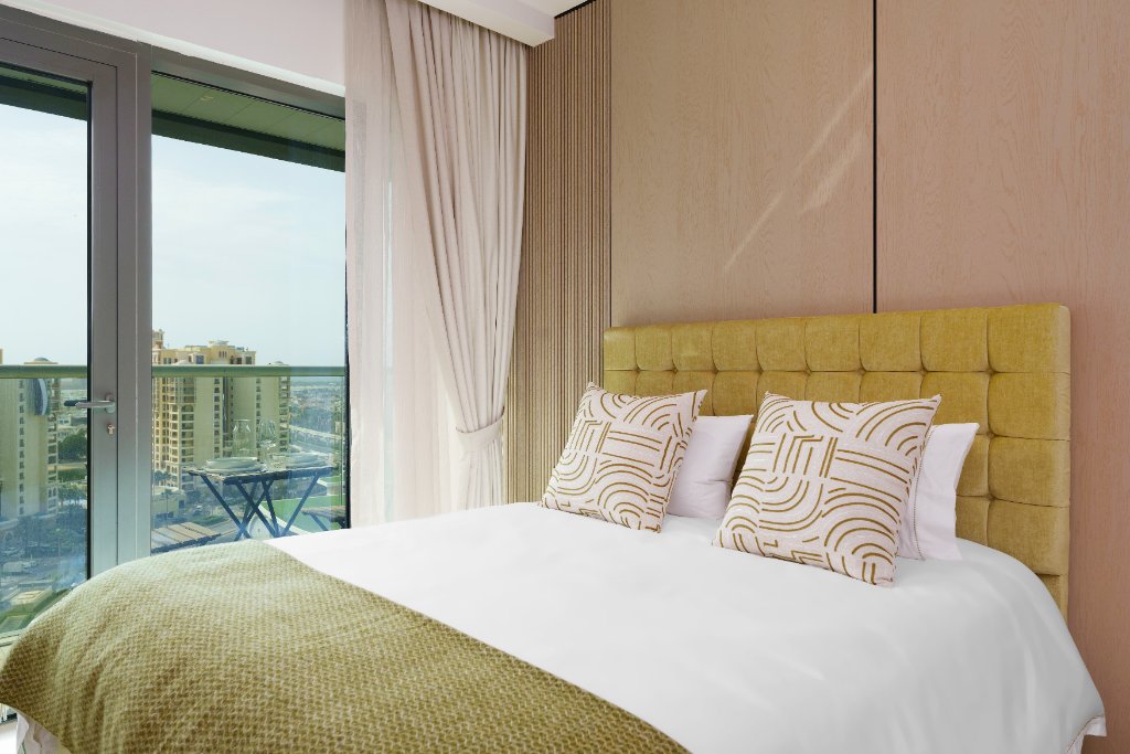 Bed with balcony view