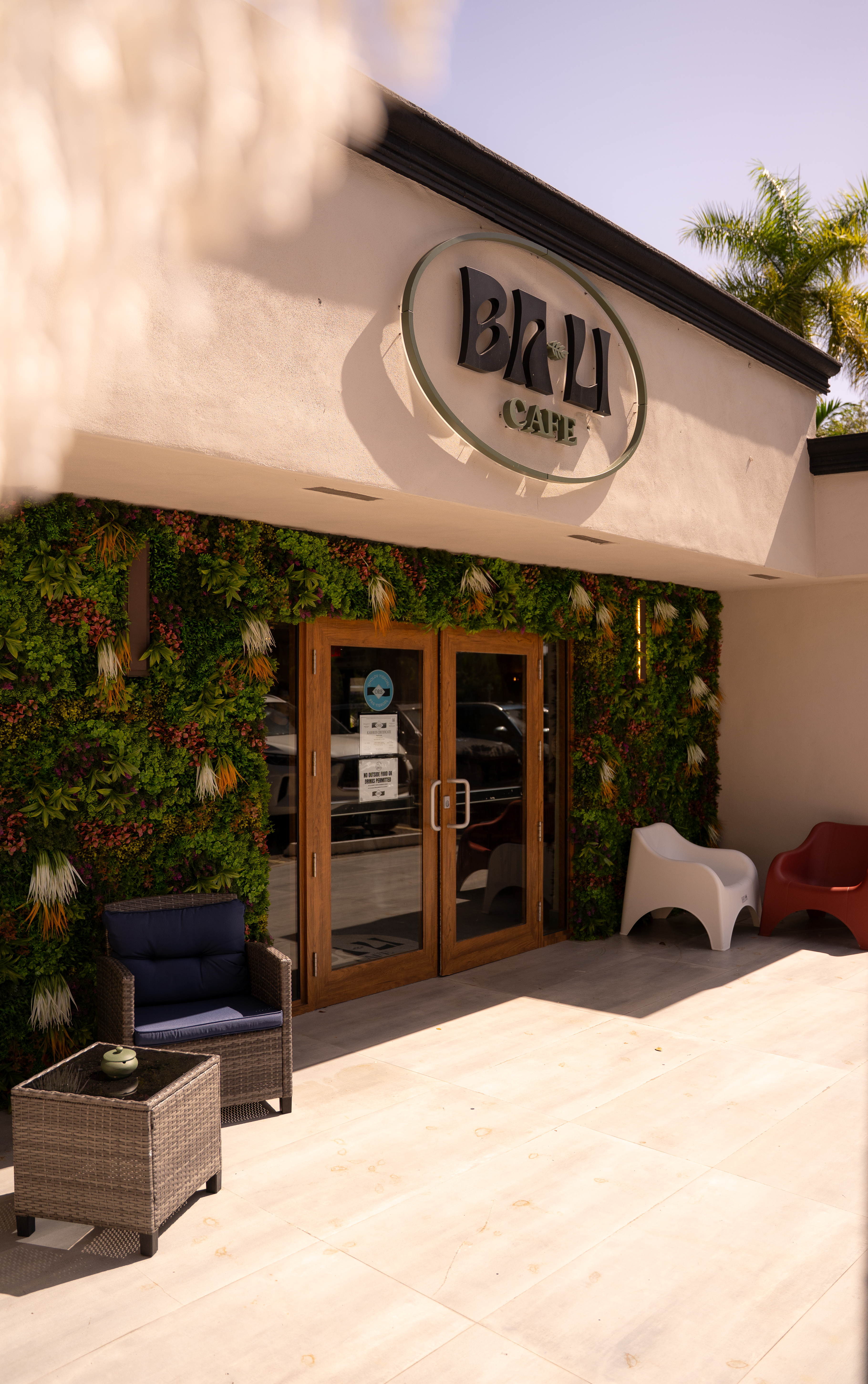 BALI Cafe interior with tropical decor and warm lighting