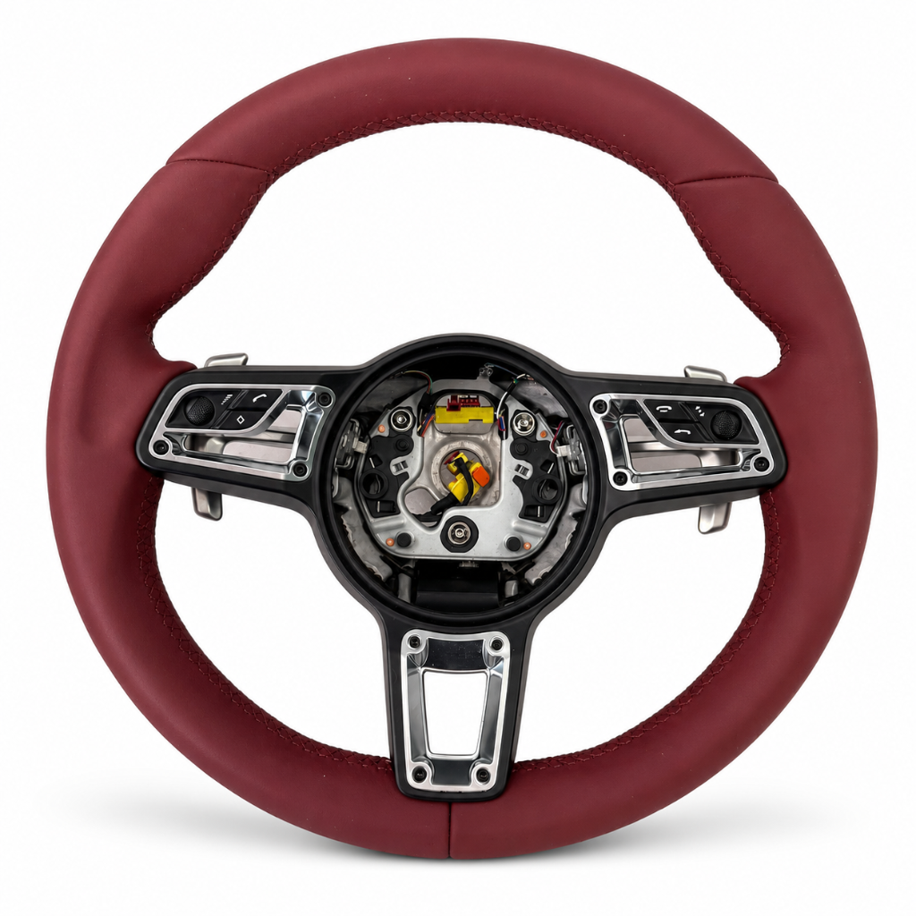 Porsche — Burgundy Leather + Chrome Spokes