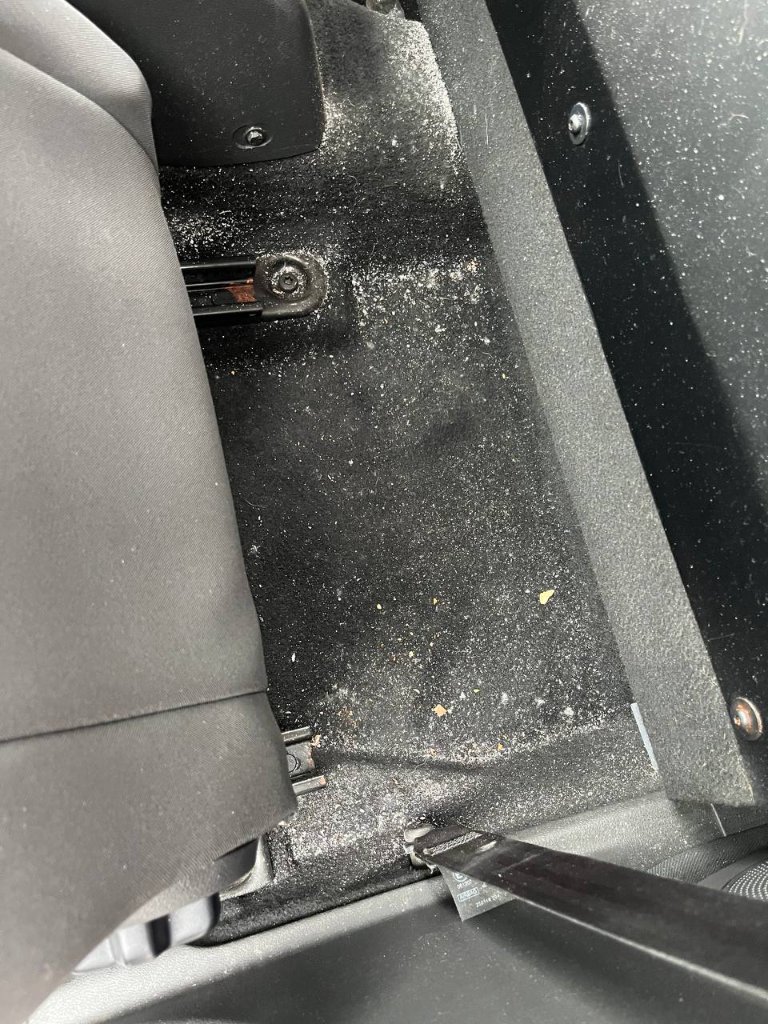 Car interior detailing — passenger floor before — mobile valeting in Sligo