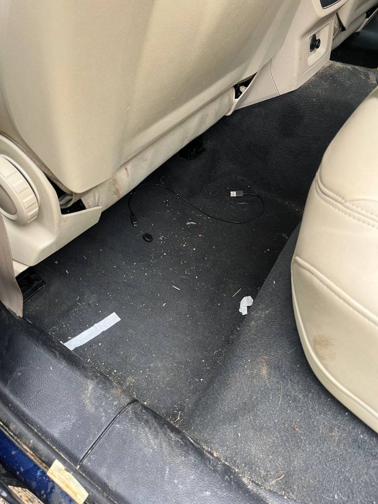 Car rear floor & seat — before mobile detailing in Sligo