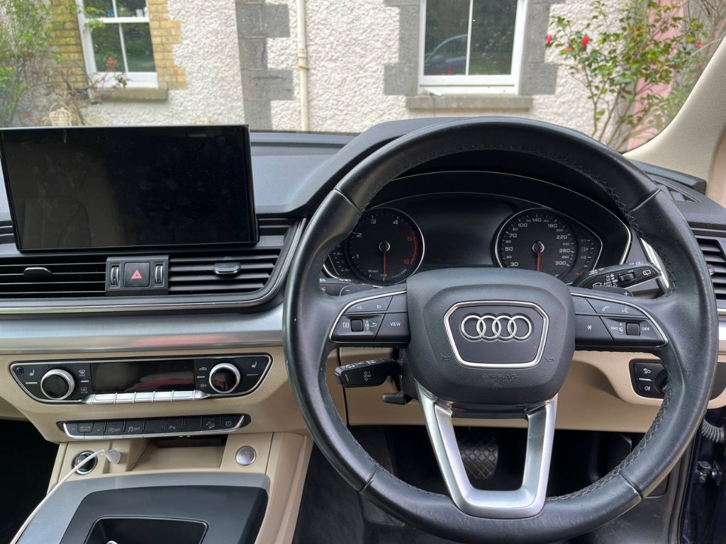 Car dashboard & console — before mobile detailing in Sligo