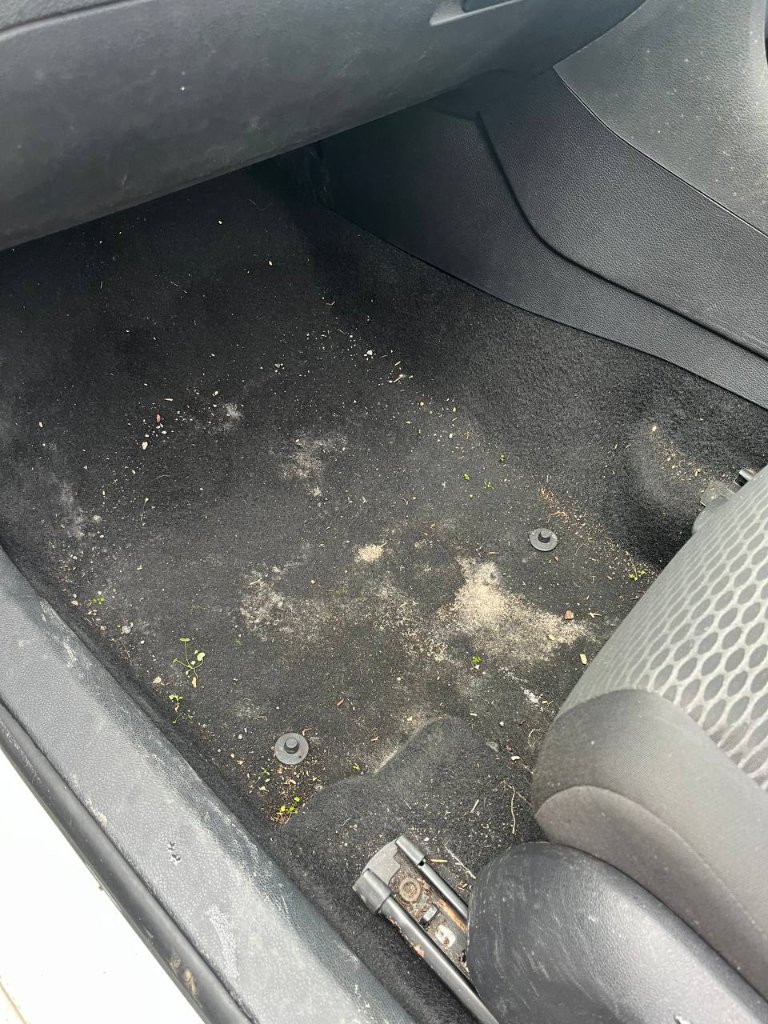 Car interior detailing — carpet & floor before — mobile valeting in Sligo