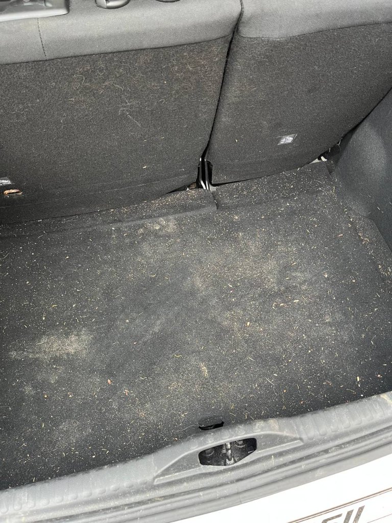 Car interior detailing — boot floor before — mobile valeting in Sligo