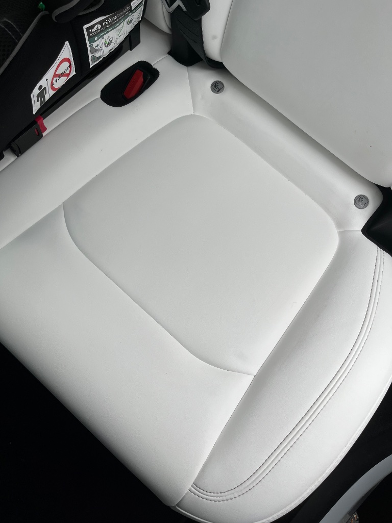 Pristine white leather car seat after deep cleaning in Sligo