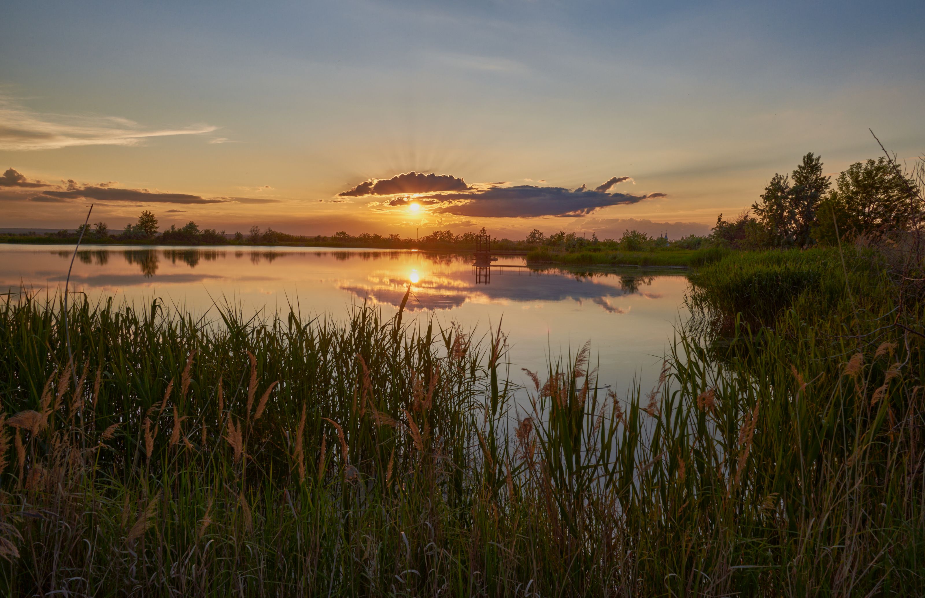 Sunset over a calm lake in Moses Lake, Washington