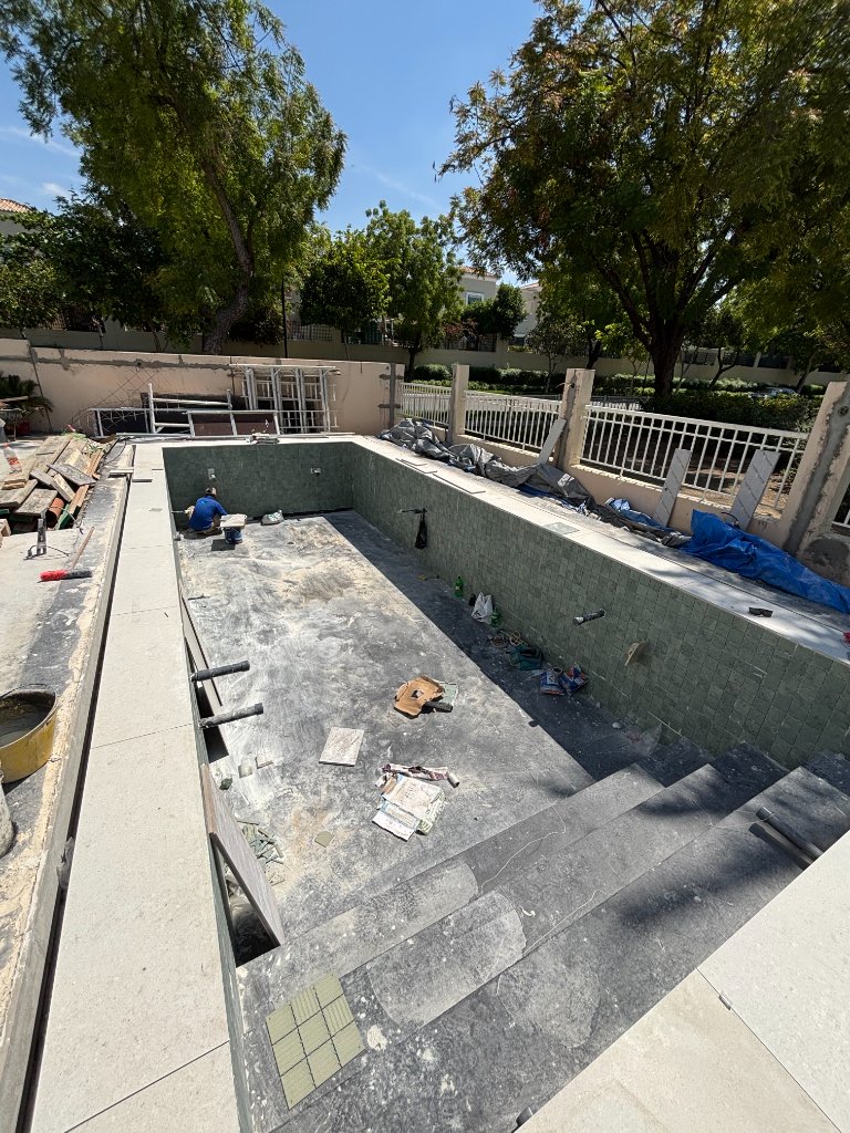 Custom villa swimming pool construction site in Dubai