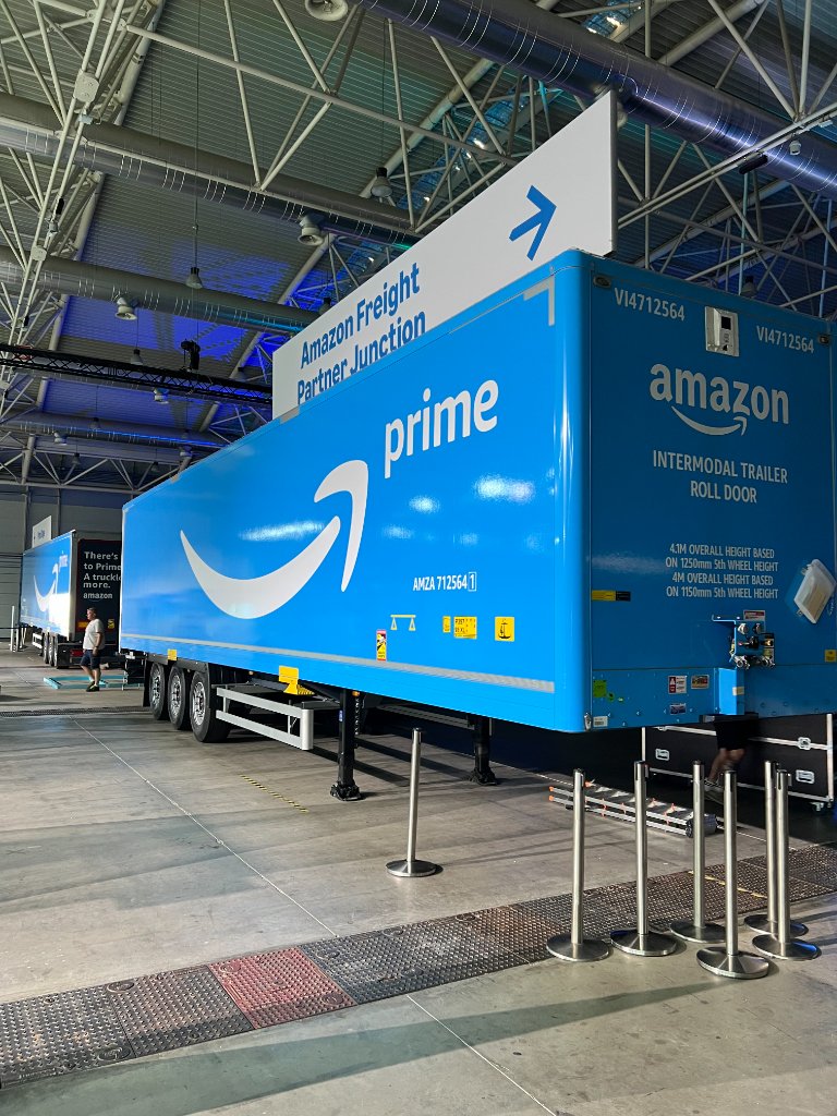 Amazon Prime freight truck at the Amazon Fastforward event venue in Rome — the real-world inspiration behind the custom Scalextric slot trucks