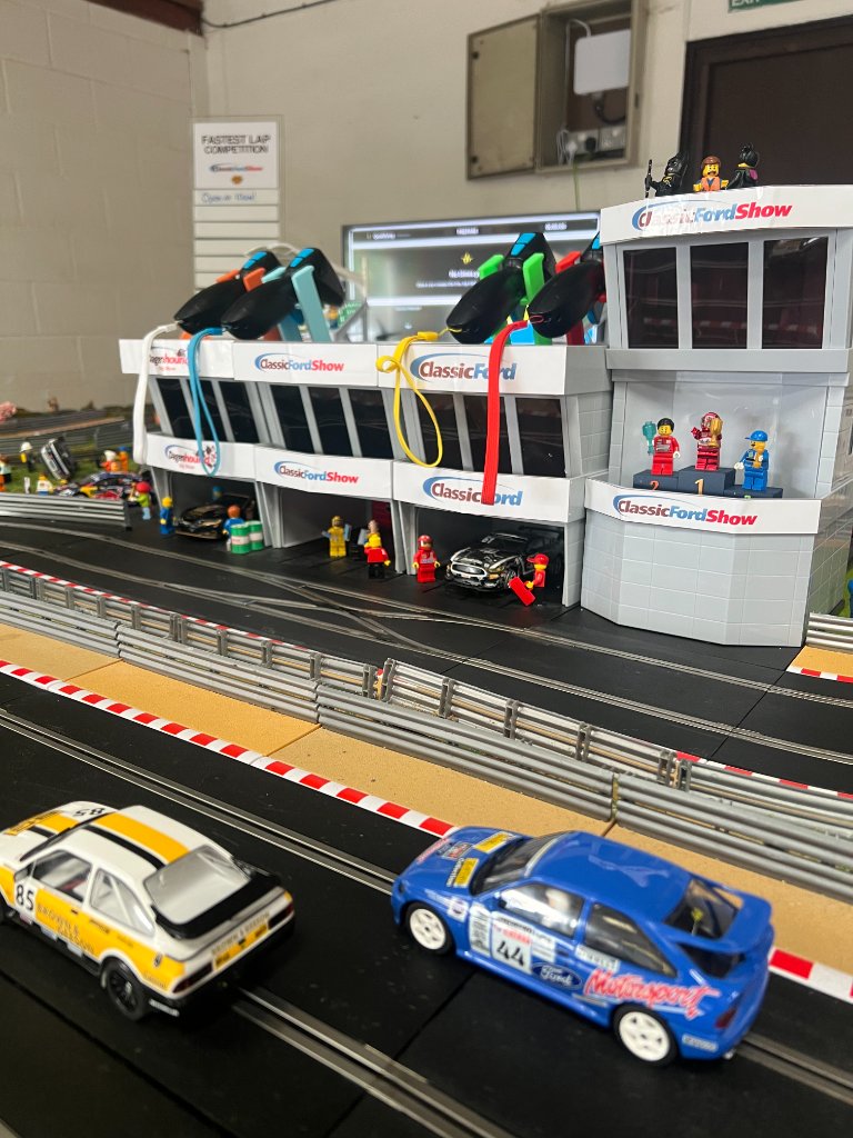 Classic Ford Show Scalextric pit lane and garage setup