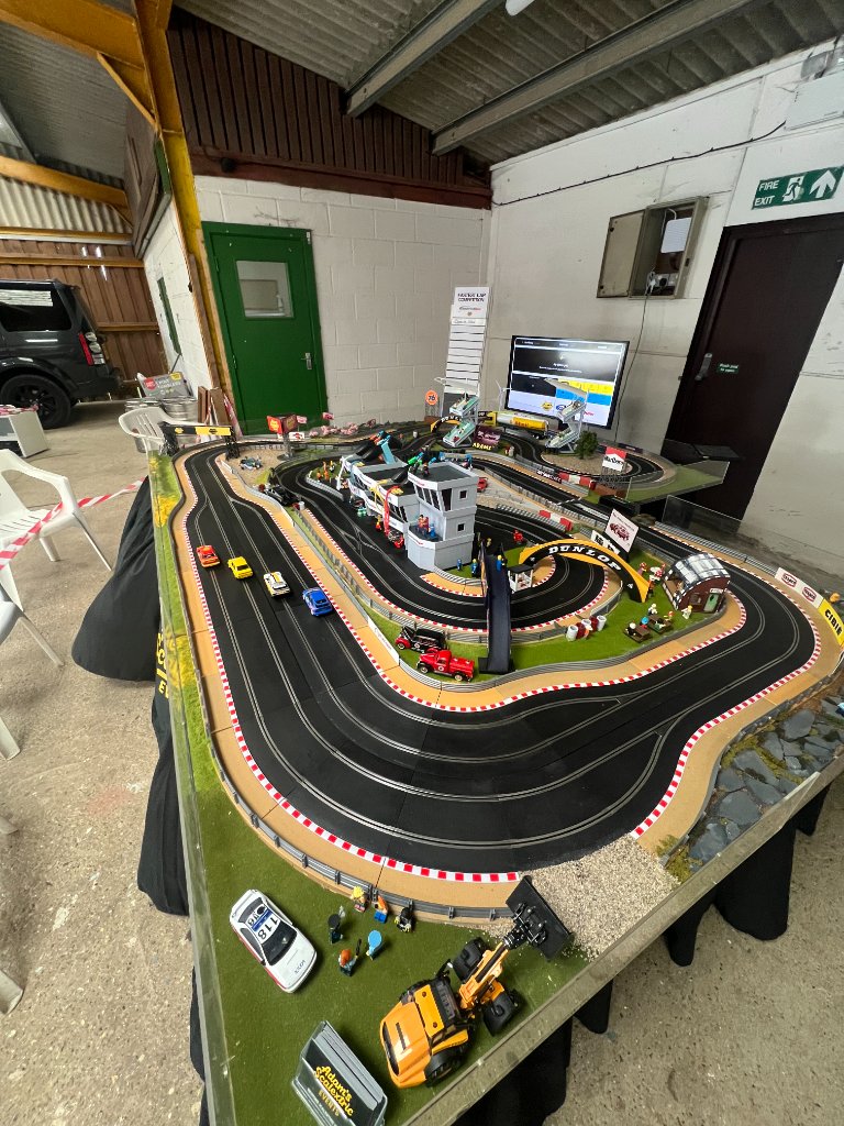 Full Scalextric circuit overview with crowd