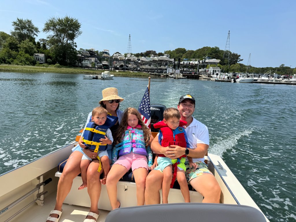The Fleming family on the water in Cape Cod