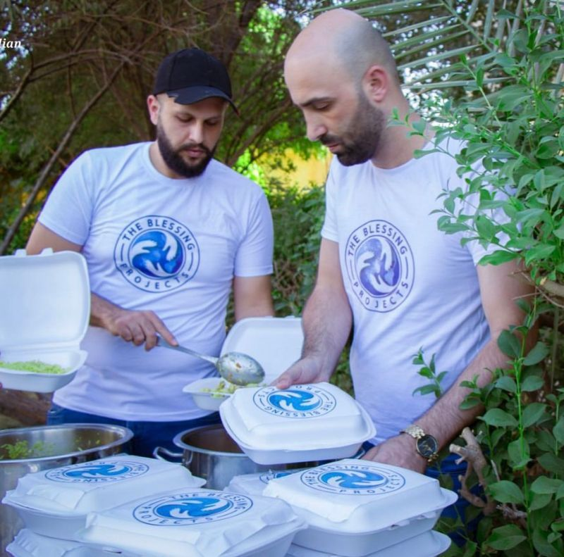 The Blessing Projects team serving meals to community