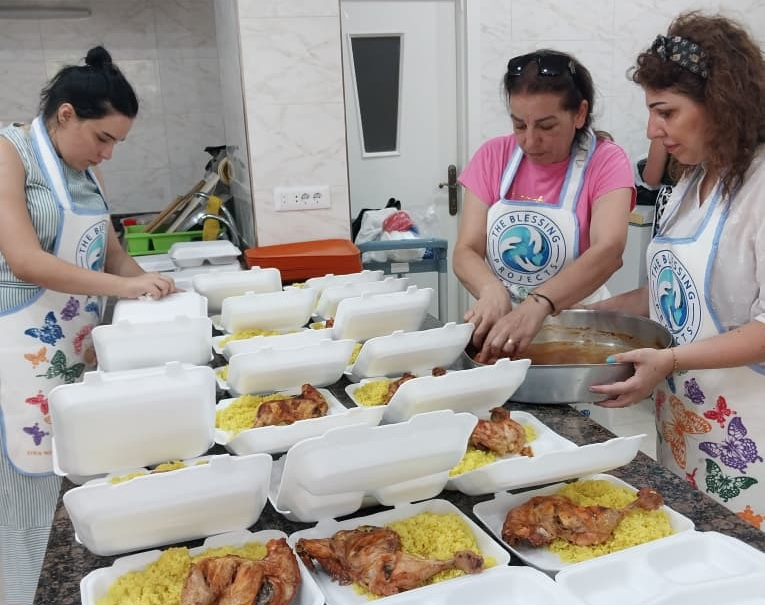 Meal Distributions for Displaced People and Cooking Lessons