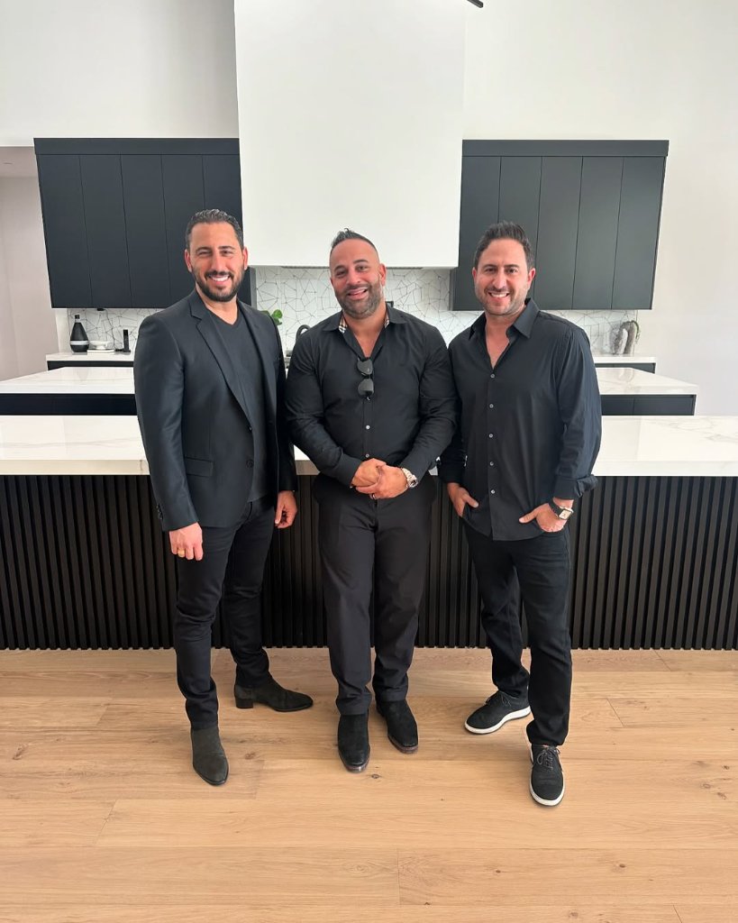 George Mevawala with Josh and Matt Altman in a luxury kitchen