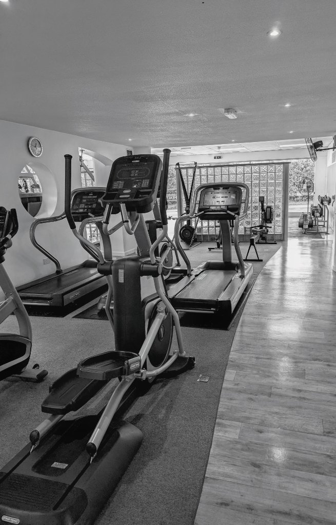 Man and woman working out in a gym