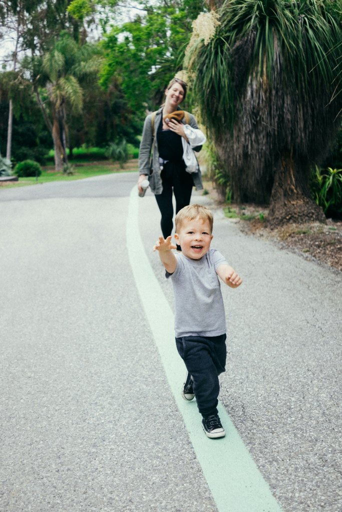 Mother and child running in the park