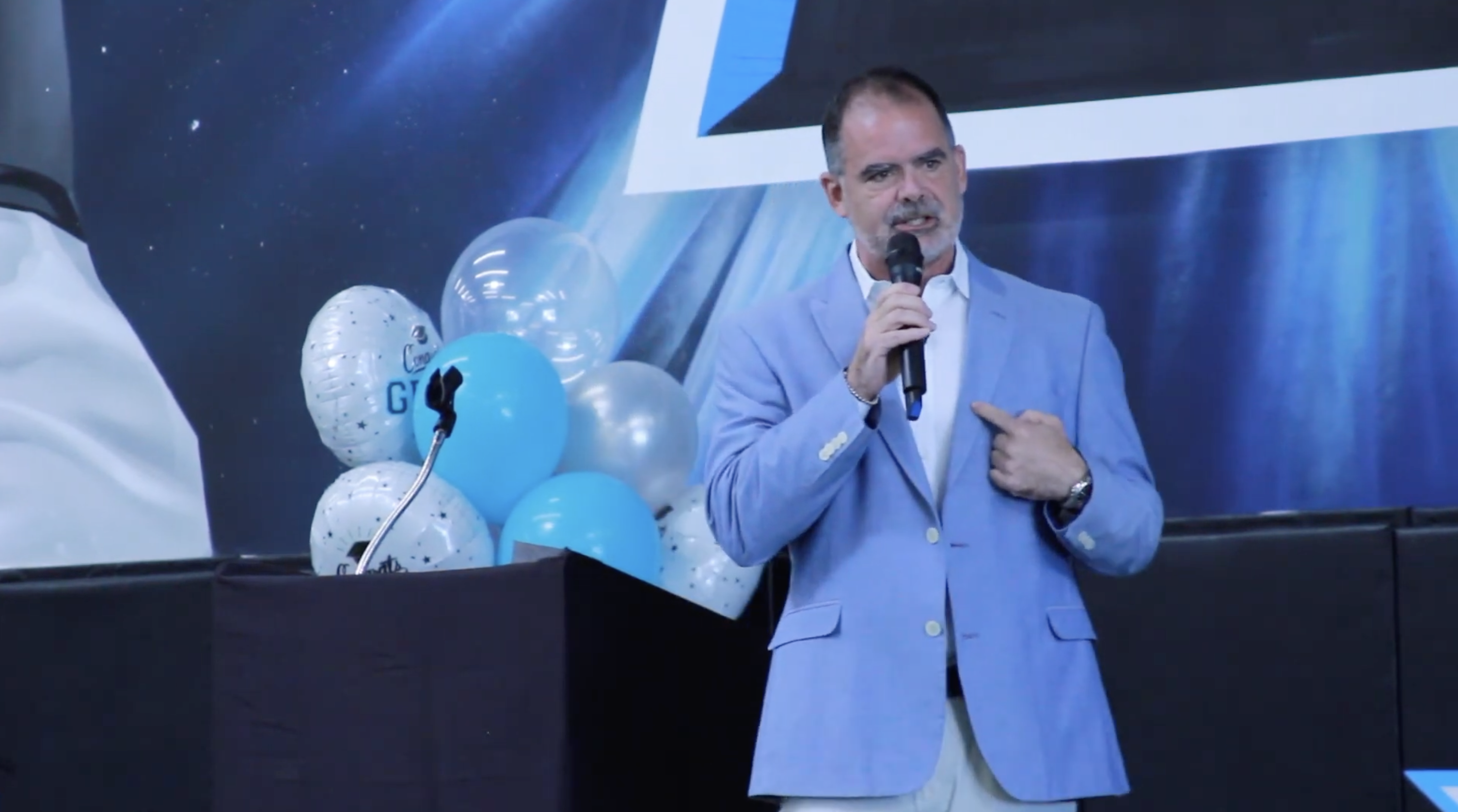 Charlie Smith speaking at the Johnson & Johnson event