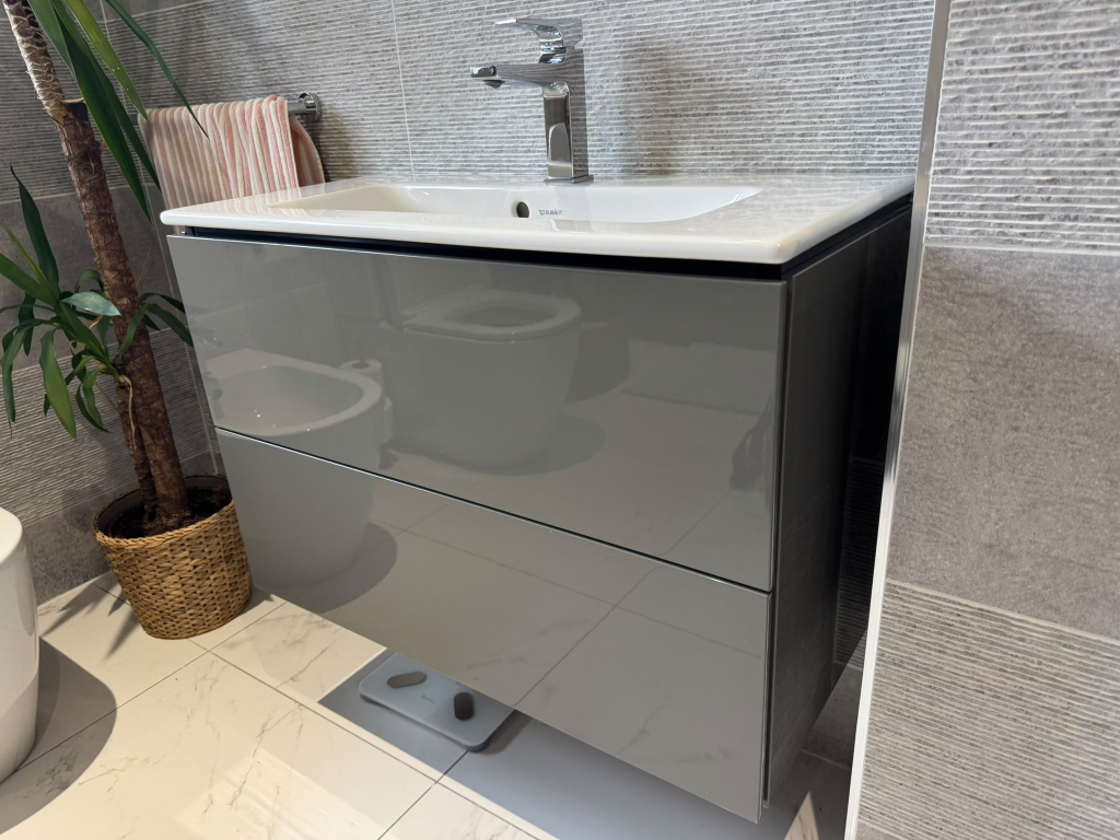 Dark grey gloss bathroom vanity unit before wrap