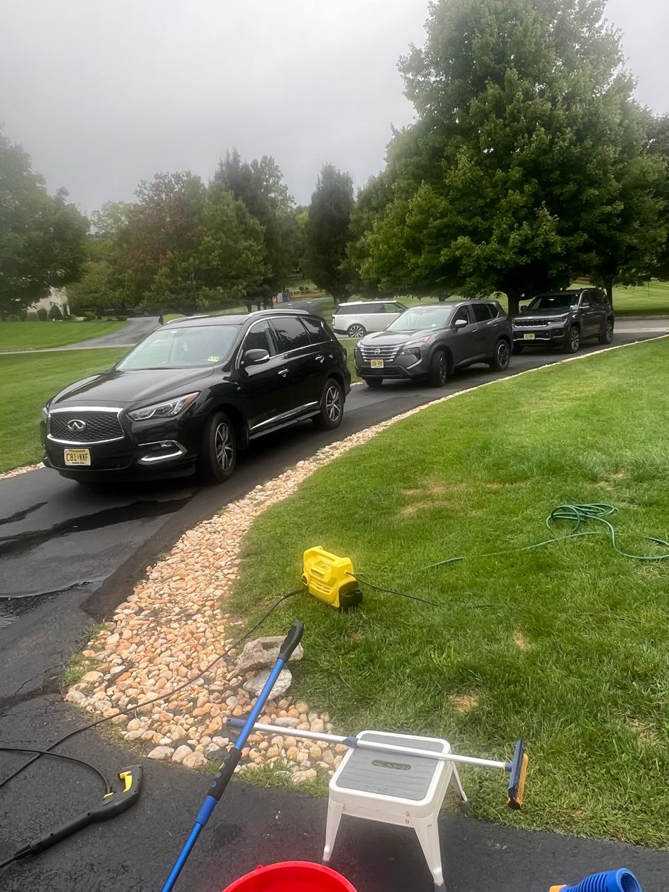 Cars lined up on the driveway