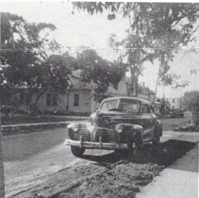 A photo of Cottage Street in 1948, you can see our Historic Office building in the distance.