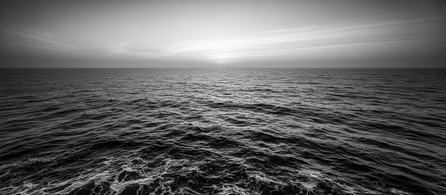 Vast ocean horizon in dramatic black and white