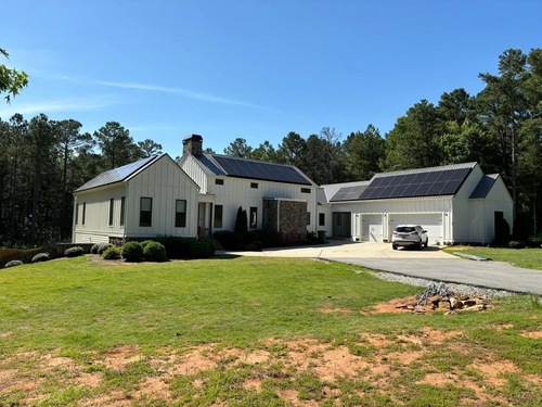 Residential home with rooftop solar panels.