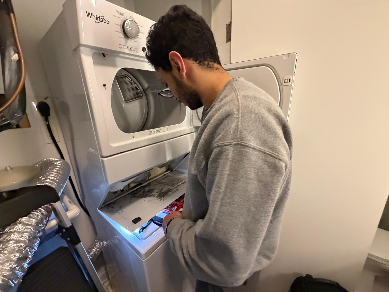 Nova technician cleaning Whirlpool dryer vent with professional tools — McLean, VA