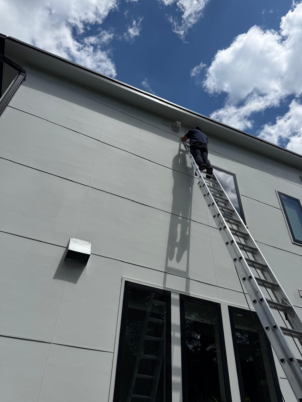 Nova Bird Removal technician accessing high vent on residential home — McLean, McLean, VA